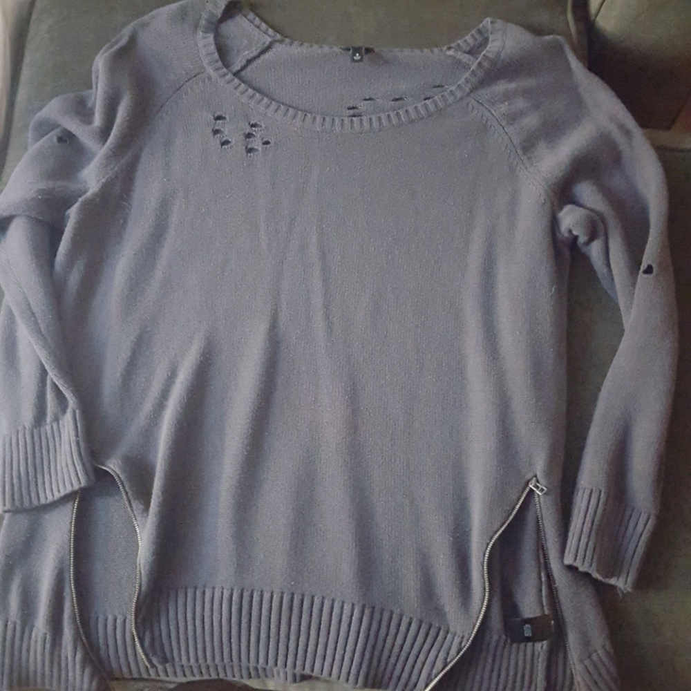 Grey sweater with zip sides and holes